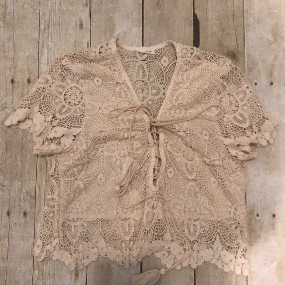 Gently worn crochet crop top by Cotton Candy LA